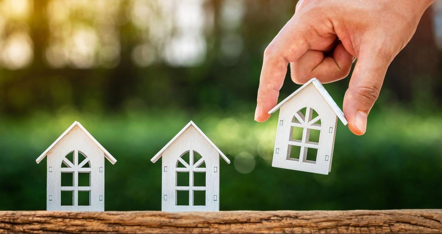 Investment properties Tiny house models representing investment properties