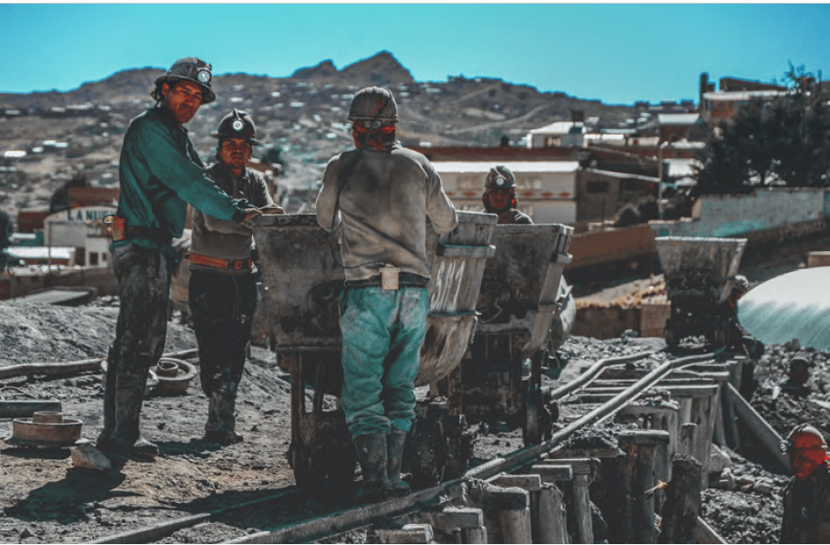 Miner-min Construction workers in hard hats at work