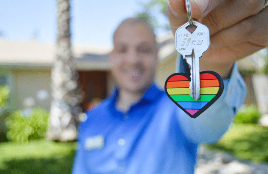 Real-Estate-Professional-min A real estate agent holding a key